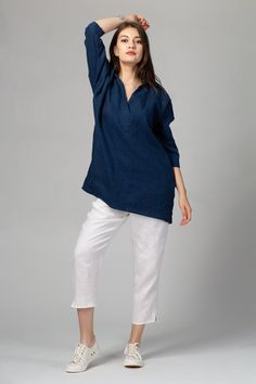 Comfortable oversized shirt tunic with split neck and side pockets.  FIT To choose the right size, check out our body and garments measurements charts displayed in the product listing photos. If you need specific sizing recommendations, please don't hesitate to contact us and we'll help you find the right fit! FEATURES -Loose, oversized fit -Deep V-neck with shirt collar -Three quarter relaxed sleeves -Straight silhouette -Concealed side pockets -French seams for increased durability and a more Relaxed Fit V-neck Tunic For Fall, Cotton V-neck Blouse With Pockets, Casual Tunic With 3/4 Sleeve And Relaxed Fit, Casual V-neck Tunic For Daywear, Oversized Tops With Pockets And 3/4 Sleeves, Daywear Relaxed Fit Tunic With Split Neck, Blue Relaxed Fit V-neck Tunic, Relaxed Fit Split Neck Tunic For Daywear, Casual Oversized Tunic Top