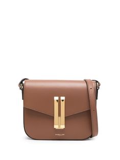 DeMellier The Vancouver Crossbody Bag - Farfetch Cognac Rectangular Bag With Turn-lock Closure, Modern Cognac Satchel With Palladium Hardware, Timeless Gold Flap Bag For Travel, Designer Cognac Satchel With Gold-tone Hardware, Modern Crossbody Flap Bag With Gold-tone Hardware, Brown Luxury Saddle Bag With Detachable Strap, Luxury Brown Saddle Bag With Detachable Strap, Gold Crossbody Flap Bag For Business, Modern Gold Flap Bag For Business