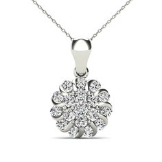 Sparkling with sweetest style, this diamond pendant pairs well with any look. Crafted in 10K white gold, this dazzling design features 3/8ctw. of brilliants round diamonds that are clustered together to form a lovely flower. Buying this with the matching earrings gives you so many style options as they work perfectly together as a set and apart with other pieces. This pendant suspends along an 18.0-inch cable chain that secures with a spring-ring clasp. 30 Days Money Back Guarantee Secure with s Flower Cluster, Cluster Pendant, Diamond Flower, Sweet Style, Cable Chain, Spring Rings, Diamond Pendant, Matching Earrings, Favorite Jewelry