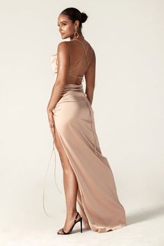 Reva' is our most elegant creation to date and the dress you've been waiting for. This satin Cowl Neckline dress is here to make your day perfect! Soft and luxurious woven satin shapes this luxe gown with a classy cowl neckline and slender rolled straps that crisscross atop the backless bodice. Sheath silhouette is sure to compliment your figure as it hugs the hips and gracefully leads into a long maxi skirt.'Reva' is fully lined for a smooth and seamless finish and has a zip to the side for eas Cowl Neckline Dress, Trumpet Evening Dress, Backless Maxi Dress, Long Maxi Skirt, Neckline Dress, Backless Maxi Dresses, Long Maxi Skirts, Cowl Neckline, Necklines For Dresses