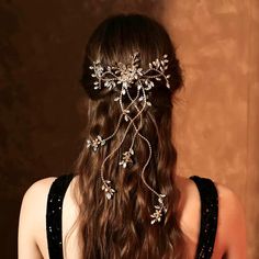 Romantic and elegant, this unique bridal hair comb with cascading vines is the perfect accessory for your special day. Adorned with intricately faceted rhinestones that capture the light from every angle with a perfectly translucent appeal, it gives your hair an extra touch of glam to finish off your perfect look on your perfect day. Cast in lightweight alloy and rhodium / gold plated for a flawless finish, the comb measures 7.5" (approx. 19cm) across and 15" (approx. 38cm) long. The small comb on the back make it easy to attach to your hair and keep it sturdily in place. The vines with crystals are flexible and can be molded based on your preferences to suit your hair style. Available in Silver and Yellow Gold finishes. To make your choice select your preferred finish from the dropdown me Unique Bridal Hair, Vine Hair Piece, Sky Outfit, Comb Hair, Bridal Hair Comb, Hair Vine, Hair Piece, Perfect Day, Wedding Hair Accessories