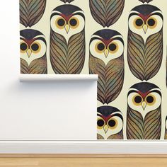 an owl themed wallpaper in a room