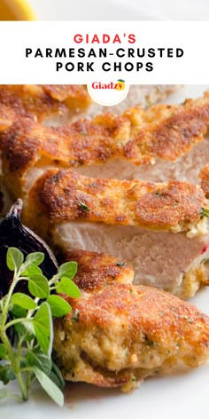 pork chops on a white plate with herbs