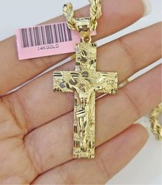 We present You with This Absolutely Stunning Real 14k Nugget Cross Charm. It has a detailed cut with a very good finish. This Pendant will not tarnish, discolor, or fade because they are Pure 14K Gold. Please feel free to contact us if you have any queries regarding the item.   Charm: Metal:14k Gold  Weight : 3-4 Grams  Weight and Width are approximate ,+/- 10% expected. Chain not included RETURN POLICY The item has to be in its original unworn condition and should be with the tag All the access Gold Crucifix Jewelry Stamped 14k, 14k Gold Crucifix Jewelry, 14k Gold Hallmarked Crucifix Jewelry, 14k Gold Crucifix Hallmarked Jewelry, Gold Diamond Cut Crucifix Jewelry, Hallmarked Yellow Gold Crucifix Jewelry, Engraved Yellow Gold Crucifix Jewelry, 14k Gold Cross Jewelry With Diamond Cut, 14k Gold Diamond Cut Cross Jewelry