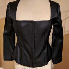 Beautiful Tapered Jacket With Hook And Eye Front Closure. Fitted Black Silk Outerwear, Black Silk Long Sleeve Blazer, Black Silk Blazer For Fall, Black Silk Blazer For Party, Classic Tailored Tops For Evening, Tailored Long Sleeve Evening Tops, Classic Fitted Silk Outerwear, Silk Long Sleeve Outerwear For Evening, Fitted Silk Winter Outerwear