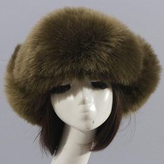 Elevate your style by adding this adorable hat to your winter skiing caps collection. The windproof hat for stylish adult women is made from a high quality combination of cotton, polyester, and faux fur materials. It's a warm Russian hat with ear flaps that is designed with a solid pattern. This trapper cap is available in a choice of 5 colors.

Specifications
Brand Name: GeraldBlack
Gender: WOMEN
Department Name: Adult
Origin: CN(Origin)
Model Number: HT3448
Pattern Type: Solid
Item Type: Bombe Winter Hat Women, Russian Hat, Faux Fur Material, Faux Fur Hat, Ski Cap, Cap Collection, Blue Summer Dresses, Trapper Hats, Ski Hats