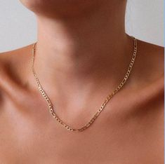 Figaro Chain,Gold Filled Chain,14k Gold Necklace,Link Chain,Dainty Chain Necklace 👀 ❤️The model is wearing the necklace in 16 inches length. ❤️Product Details ❤️Handmade / Handcrafted Fine Jewelry ❤️Metal:14K Gold Filled,Rose Gold Filled,925k Sterling Silver Other styles are available in our shop at https://www.etsy.com/shop/SilverbySelene. Please contact us if you have any questions or requests/ideas for our shop, we'd love to hear from you! Dainty Gold Chain Necklace, Chain Designs Gold, 22k Gold Chain, Gold Figaro Chain, Dainty Chain Necklace, Figaro Necklace, Gold Chain Design, Figaro Chain Necklace, Dainty Chain