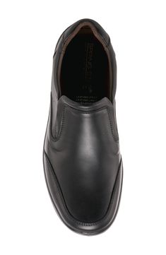 Premium leather and a padded collar offer luxe elements on a versatile slip-on featuring a removable, cushioned insole and shock absorbent sole. Leather upper/leather and synthetic lining/synthetic sole Made in Turkey Leather Round Toe Slip-ons For Business, Formal Swift Leather Slip-ons With Round Toe, Synthetic Moc Toe Slip-ons With Rubber Sole, Black Slip-ons With Leather Footbed, Leather Slip-resistant Dress Shoes With Round Toe, Business Slip-ons With Swift Leather And Round Toe, Business Slip-ons With Slip-resistant Plain Toe, Business Slip-resistant Slip-ons With Plain Toe, Leather Shoes With Cushioned Footbed For Work