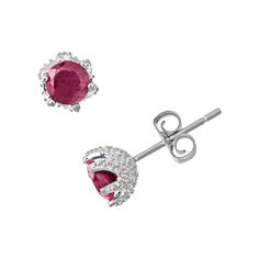 Dazzle them. Round-cut ruby stones give these stud earrings a captivating glow. You'll be the center of attention every time you wear these sterling silver studs.    Studded details accent the sides of the six-prong settings.    Earrings come in a gift box.    Details:            7-mm diameter        Pierced        Post backings        Rhodium-plated sterling silver         Size: One Size. Gender: unisex. Age Group: adult. Ruby Stud Earrings, Ruby Earrings Studs, Harry Potter Jewelry, Sapphire Earrings Studs, Emerald Earrings Studs, Sapphire Studs, Sterling Silver Stud Earrings, Silver Engagement Rings, Silver Stud Earrings