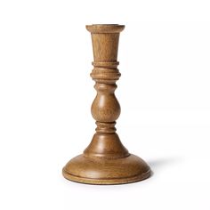 a wooden candle holder on a white background