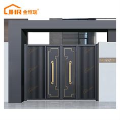 an image of a black and gold double door with two handles on each one side