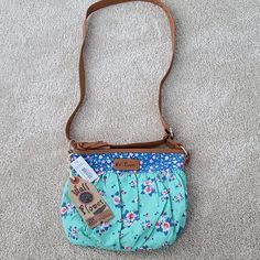 Floral Cross Body Hand Bag. Blue Canvas Shoulder Bag For Spring, Spring Blue Bags For Daily Use, Blue Tote Satchel For Spring, Blue Bags For Daily Use In Spring, Blue Trendy Satchel For Spring, Trendy Blue Satchel For Spring, Blue Casual Satchel For Summer, Spring Satchel With Removable Pouch, Blue Pouch Shoulder Bag For Spring