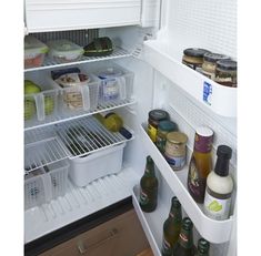 an open refrigerator filled with food and condiments