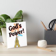 a greeting card with the words god's power on it and a flower art board print