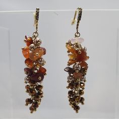 Ali Khan Crystal Glass Bead Cluster Cascade Drop Earring Topaz Sapphire Pearl With Gold Frame And Rhinestones Fish Hook Earring 2.5 Inch Length Elegant Multicolor Beaded Crystal Earrings, Elegant Brown Chandelier Earrings With Dangling Beads, Elegant Multicolor Crystal Earrings With Dangling Beads, Elegant Brown Beaded Chandelier Earrings, Elegant Brown Beaded Dangle Earrings, Candy Corn Earrings, White Hoop Earrings, Pink Sapphire Earrings, Tiny Jars