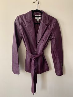 Spiegel plum soft leather blazer. One button with leather tieback. Beautiful condition. Size 6. Chic Purple Blazer For Fall, Formal Belted Leather Jacket, Purple Fall Office Blazer, Burgundy Leather Jacket For Spring Workwear, Chic Burgundy Leather Jacket, Fitted Burgundy Leather Jacket For Work, Spring Business Blazer In Purple, Spring Business Purple Blazer, Purple Business Outerwear For Fall