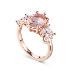 This enchanting piece features a stunning oval-cut morganite as the center stone, radiating beauty and sophistication. Adorning the sides of the main stone are clusters of brilliant white stones, adding a touch of sparkle and enhancing its timeless appeal. Crafted with meticulous attention to detail, this ring captures the essence of refined luxury. The soft, blush-pink hue of the morganite exudes a sense of romance and tenderness, making it a perfect choice for expressing love and devotion. The delicate arrangement of the white stones creates a harmonious balance, accentuating the brilliance of the main stone and illuminating the wearer's hand with a captivating glow. Indulge in the allure of this morganite oval cut ring, a testament to the everlasting beauty of fine jewelry.Carat Weight: Luxury Oval Morganite Jewelry, Oval Morganite Rings In Pink Gold, Exquisite Oval Morganite Ring, Oval Morganite Jewelry With Gemstone Accents, Blush Morganite Oval Jewelry, Expressing Love, Oval Cut Ring, Divine Love, White Stones