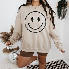 "Distressed Smile Face Hoodie, Smile Face Sweatshirt For Friends' Birthday Gift, Smile Face Hoodie, Happy Sweatshirt For Men And Women, Smile Material Details Gildan Brand Unisex Long Sleeve Hoodies/ C.Neck Sweatshirt No Drawcord in Youth Hoodies For Added Safety Cotton and Polyester Blend Sizing Size charts are provided in the photos, please refer to the charts before placing your order. HOW TO ORDER: 1️- Select the shirt size and color. 2️- Please Enter Design Color on to the Personalization B Fun Crew Neck Winter Sweatshirt, Fun Winter Crew Neck Sweatshirt, Casual Winter Birthday Tops, Long Sleeve Hoodie With Letter Print For Birthday, Birthday Long Sleeve Hoodie With Letter Print, Casual Cotton Hoodie For Birthday, Birthday Letter Print Long Sleeve Hoodie, Casual Cotton Sweatshirt For Birthday, Fun Winter Sweatshirt With Letter Print