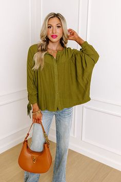 You and this darling green shift top were made for each other with its lightweight material, a button up front with a rounded neckline, long loose sleeves with tie closure cuffs, and a relaxed silhouette that falls into a straight hemline! Measurements S : Bust 54", Hip 48", Length 23.5", Sleeve Length 21", Waist 52". M : Bust 56", Hip 50", Length 24", Sleeve Length 21", Waist 54". L : Bust 58", Hip 52", Length 24.5", Sleeve Length 21.5", Waist 56". XL : Bust 60", Hip 54", Length 25", Sleeve Len Made For Each Other, Concert Fashion, Essential Dress, Loose Sleeves, Teacher Style, Rounded Neckline, Curve Dresses, Model Fits, Women Clothing Boutique