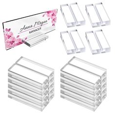 six clear acrylic business cards with matching holders