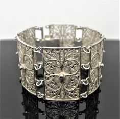 Magnificent antique jewelry created with precision craftsmanship.  SILVER marked 800 FILIGREE BRACELET handcrafted  Byzantium style  vintage  antique length: 6 3/4 inches, 17 cm A fine gift for life Classic Formal Bracelets With Intricate Design, Classic Ceremonial Bracelet With Intricate Design, Classic Formal Cuff Bracelet With Intricate Design, Classic Intricate Cuff Bracelet For Formal Occasions, Classic Ceremonial Hallmarked Bracelets, Traditional Formal Jewelry With Historical Design, Classic Bangle Bracelet With Intricate Design, Traditional Jewelry With Historical Design For Collectors, Formal Victorian Bangle With Intricate Design