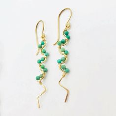 Dainty and delicate gold filled earrings with Authentic Kingman Turquoise from Arizona. Uniquely beautiful and carefully sourced. 1 3/4" drop length. Each pair is made to order and may vary slightly from photo. Turquoise 14k Gold Filled Bohemian Earrings, Bohemian Turquoise 14k Gold-filled Earrings, Turquoise Bohemian 14k Gold-filled Earrings, Bohemian Turquoise 14k Gold Filled Earrings, Elegant Turquoise 14k Gold Filled Earrings, Turquoise Gold Bohemian Earrings, Turquoise 14k Gold Filled Earrings As Gift, Turquoise 14k Gold Filled Earrings For Gift, Gift Turquoise 14k Gold Filled Earrings