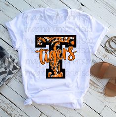 Sublimation School Spirit Shirts, Tigers School Spirit Shirts, Tigers Shirt Design, Tigers Spirit Wear, White Cotton Sublimation Design With Printed Details, White Custom Print Sublimation Design For Fan Merchandise, Cotton Sublimation Print T-shirt For Fan Merchandise, Cotton Tie Dye Sublimation T-shirt With Graphic Print, Tie Dye Cotton Sublimation T-shirt With Graphic Print