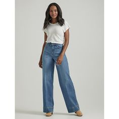 This denim makeover adds a modern twist to the trouser, complete with a high-rise fit, a billowy denim, and extra material below the hem that's the perfect length for your favorite high-heeled boots. Made from a soft cotton blend with just a hint of stretch, they're made to fit your body perfectly from the very first wear. 99% Cotton, 1% Spandex. Elevated Retro Blue. 10 W / 34 Inches (L). Trendy Everyday Jeans With Buttons, Mom Fashion, Riders Jacket, Coffee Girl, Retro Blue, Vintage Vest, Vintage Shorts, Trouser Jeans, Mom Style