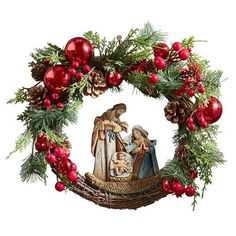 christmas wreath with nativity scene and pine cones