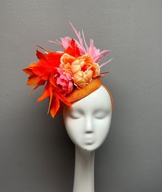 This bold fascinator is perfect for horses races, bridal showers, tea parties, hat luncheons or any other special event.  ► Want it now? Click the "Buy it now" button. ► Love it and want to buy later? Click on the button that says "♥ Favorite" ► Special request/contact me? Click the "Ask a question" link on the right. ► All Sales Are Final. Please contact me before purchasing if you have any questions. ► My shop policies: https://www.etsy.com/shop/tinselandtonic/policy?ref=shopinfo_policies_leftnav Thanks for visiting Tinsel and Tonic!! Please visit my other shops - wrapmeinfur.etsy.com for all your faux fur scarf needs  and abitoftinsel.etsy.com for one of a kind statement jewelry Bridal Shower Headband, Shower Headband, Hot Accessories, Floral Fascinator, Floral Fascinators, Faux Fur Scarf, Faux Fur Scarves, Wedding Fascinators, Fur Scarf