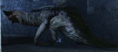 a creepy looking creature with long hair and claws on it's back, in a dark room