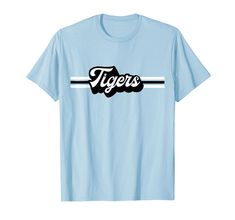 PRICES MAY VARY. Support your sports team with this vintage-inspired Tiger mascot t-shirt. Great shirt for all sports teams, Football, Baseball, Soccer, Basketball, Track, Softball, Swim Team, Cheerleading, Marching Band. High School mascot, college, school spirit Great gift for birthdays or Christmas for a Tigers sports fan in high school, middle school, elementary school or college! Retro Shirt, Graphic Tee, Black and White Stripe, Team colors available, Mens, Womens, Kids, Youth, Mom, Dad, Li Band High School, High School Mascots, Tiger Mascot, School Elementary, School Middle School, Tiger Shirt, College School, Swim Team, Sports T Shirt