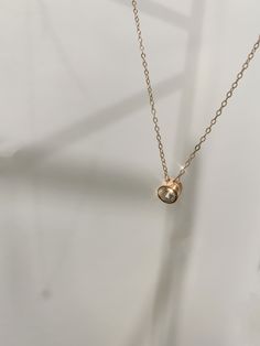 "Rose gold in 925 sterling silver with a round brilliant cz. Trendy gold filled necklace with a tiny cubic zirconia at the center. It adds just a touch of sparkle to your outfit. Pendant Size : 6mm length : 15.5\" + extension 2\" ♥Shipping♥✈ It will take approx. 3-5 business days to US, and 1 - 2 weeks to all of the countries. All orders would be shipped it out within 1 to 2 business days. ♥GREETINGS♥ If you are buying gifts for someone and have them mailed to the person directly, we are always Dainty Rose Gold Cubic Zirconia Diamond Necklace, Minimalist Rose Gold Diamond Necklace With Clavicle Chain, Minimalist Rose Gold Clavicle Chain Diamond Necklace, Minimalist Rose Gold Round Diamond Necklace, Anniversary Rose Gold Cubic Zirconia Solitaire Necklace, Fine Jewelry Rose Gold Solitaire Necklace With Cubic Zirconia, Rose Gold 14k Gold Solitaire Necklace With Delicate Chain, Rose Gold Round Birthstone Necklace With Delicate Chain, Round Rose Gold Birthstone Necklace With Delicate Chain