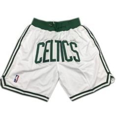 a basketball shorts with the word celtcs written in green and white on it