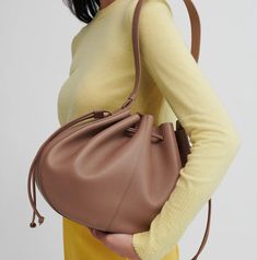 Flores Bag - Blush Modern Luxury Brown Bags, Elegant Bucket Satchel For On-the-go, Chic Everyday Luxury Pouch Bag, Elegant Brown Bucket Bag For On-the-go, Brown Luxury Shoulder Bag Crossbody, Brown Luxury Everyday Crossbody Shoulder Bag, Luxury Pouch Shoulder Bag With Detachable Strap, Modern Brown Satchel For Everyday Luxury, Luxury Pouch Satchel For Everyday