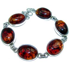 Handmade Unique 925 Sterling Silver bracelet with unique one of a kind Amber,  33.50 grams of marvelous handcrafted jewelry design. Only one piece availble ready to ship! It's unique worldwide bracelet - simply piece of art in world of fine jewelry. HUGE Beautiful  Amber .925 Sterling Silver handcrafted  Bracelet  BRACELET DETAILS: Weight: 33.50g; Material: Sterling Silver; Main stone: Amber; Width (widest section): 3/4 inch; Inner circumference: 8 1/4 inch; Clasp: Lobster-claw labs; Stamp / Mar Artisan Cabochon Bracelet Jewelry, Unique Silver Bracelet With Cabochon, Oval Handmade Bracelets For Gifts, Silver Artisan Bracelet With Cabochon, Artisan Silver Bracelet With Cabochon, Sterling Silver Cabochon Bracelets As Gifts, Sterling Silver Bangle Bracelets With Cabochon, Bohemian Sterling Silver Oval Bracelets, Unique Sterling Silver Bangle For Jewelry Making