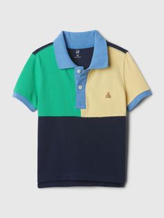 Soft knit pique polo shirt.  Spread collar, button placket.  Short sleeves.  Embroidered Brannan Bear at chest.  Hits at the hip.  Sizes range from baby to toddler. Fitted Color Block Polo Shirt, Summer Short Sleeve Color Block Polo Shirt, Summer Color Block Short Sleeve Polo Shirt, Sporty Color Block Cotton Polo Shirt, Preppy Polo Shirt With Polo Collar For Summer, Summer Cotton Color Block Polo Shirt, Blue Collared Polo Shirt Preppy Style, Fitted Multicolor Polo Shirt, Summer Color Block Cotton Polo Shirt