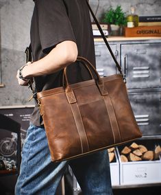 Vintage Leather Briefcase Full Grain Leather Messenger Bag Men Leather Shoulder Bag Leather Laptop Bag Business Handbag A Full grain leather briefcase that expresses perfect harmony between hard and soft. Top-quality full grain leather gives a sentimental feel, but the lines convey a light touch of modern. Timeless and current. Urban practicality with charisma.Briefcases for men are more than an accessory. A leather briefcase bag is an extension of who you are and what you believe in. When we craft leather briefcase bags for men, they are designed to securely house what’s necessary for taking care of business. Practicality is included, as this design snugly fits your 16" laptop, features spacious inner pocket for pens or phone.Leather briefcase for men can be a great addition to any outfit Leather Briefcase Bag, Leather Messenger Bag Men, Business Laptop Bag, Briefcase Bag, Leather Suspenders, Bag Business, Leather Laptop Bag, Briefcase For Men, Backpack Travel Bag