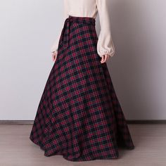 Black plaid skirt: - Side seam pockets - Hidden zipper in the side seam - Separate sash - Classic tartan pattern - Fabric is 40% wool, 58% polyviscose, 2% of elastane Model is 6'2'', she wears US 8 US 0  Bust 82 cm (32.5 inches) Waist 64 cm (25 inches) Hips 89 cm (35 inches) US 2  Bust 85 cm (33.5 inches) Waist 66 cm (26 inches) Hips 92 cm (36 inches) US 4  Bust 88 cm (34.5 inches) Waist 68 cm (27 inches) Hips 94 cm (37 inches)  US 6  Bust 90 cm (35.5 inches) Waist 71 cm (28 inches) Hips 96 cm (38 inches)  US 8  Bust 93 cm (36.5 inches) Waist 74 cm (29 inches) Hips 99 cm (39 inches) US 10  Bust 95 cm (37.5 inches) Waist 76 cm (30 inches) Hips 102 cm (40 inches) US 12  Bust 99 cm (39 inches) Waist 80 cm (31.5 inches) Hips 105 cm (41.5 inches) US 14  Bust 103 cm (40.5 inches) Waist 84 cm (33 Plaid Full Skirt For Work, Plaid Flared Skirt With Relaxed Fit, Plaid Flared Relaxed Fit Skirt, Plaid Flared Skirt, Scottish Plaid Skirt For Winter, Winter Scottish Plaid Skirt, Plaid Relaxed Fit Skirt For Fall, Fall Plaid Relaxed Fit Skirt, Relaxed Plaid Skirt For Fall