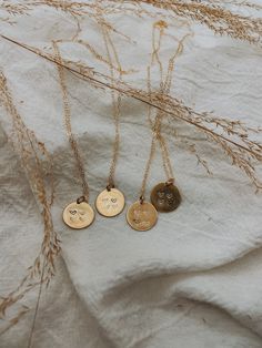 16mm hand stamped brass pendant on a 14k gold filled chain made by me.  This piece can be customized with however many hearts needed for your sisters. A different heart will be filled on each necklace to symbolize that sister/best friend.  Comes in a small black box. Brass will age and patina with time, a small polishing cloth will come with each necklace and will help keep it shiny if wanted!  Please message me with any special requests ☺️ Gold Heart Charm Necklaces For Friendship, Hand Stamped Heart Jewelry For Friendship, Minimalist Hand Stamped Charm Necklace For Best Friend, Gold Heart Necklace For Mother's Day Friendship, Dainty 14k Gold Filled Hand Stamped Necklace, Dainty Hand Stamped Necklaces For Best Friend Gift, Everyday 14k Gold-filled Hand-stamped Charm Necklaces, Everyday 14k Gold-filled Hand Stamped Charm Necklaces, Dainty Heart-shaped Hand Stamped Charm Necklace