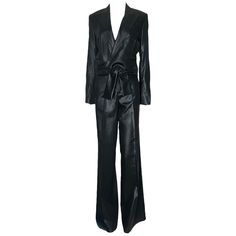 STUNNING GUCCI TAILORED PANT SUIT FROM TOM FORD'S FOR GUCCI A Gucci by Tom Ford pants suit Stunning piece consisting of pants and jacket Made out of finest shiny fabric with hand-stiched details Wrap-style jacket Real opening button on sleeve Wide leg pants, still unhemmed Made in Italy Dry Clean Only Size 40 Never worn, tags still attached Luxury Long Sleeve Fall Pantsuit, Luxury Long Sleeve Pantsuit For Fall, Chic Full Length Suits For Fall, Chic Full-length Fall Suits, Chic Full Length Fall Suits, Tom Ford Pants, Gucci By Tom Ford, Tom Ford Gucci, Gucci Jacket