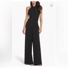 Trade In Your Lbd For Something A Bit More Modern, Like This Halter-Neck Jumpsuit That Can Be Easily Dressed Up Or Down With A Change Of Footwear. 57" Length; 32" Inseam; 26" Leg Opening (Size 8) Halter Neck Sleeveless, With Cutaway Shoulders Lined 97% Polyester, 3% Spandex Dry Clean Or Hand Wash, Line Dry Imported Model Stats: 5'10" Height, 32" Bust, 25" Waist, 36" Hip. Model Is Wearing Size 8. Questions? Leave A Comment Below! Formal Stretch Jumpsuits And Rompers, Sleek Jumpsuits And Rompers For Going Out, Elegant Jumpsuits And Rompers For Date Night, White Lace Jumpsuit, High Neck Jumpsuit, Black Lace Jumpsuit, Halter Neck Jumpsuit, Jordans Women, Sequin Jumpsuit