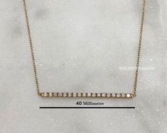 Gold Thin Bar Necklace, Moissanite Bar Necklace, 14K Yellow - Rose - White Gold Necklace, Diamond Necklace, Gold Bar Pendant, Gift For Her, Anniversary Gift For Her ✦ CENTER STONE DETAIL ✦ ✧ Stone Type : Moissanite ✧ Stone Clarity: VVS1 ✧ Luster: Excellent ✧ Make: High-Quality Craftsmanship Chain Width : 0.70mm Available Chain Lenth : 14 , 16 and 18 inches   ✦ 𝐌𝐞𝐭𝐚𝐥 𝐃𝐞𝐭𝐚𝐢𝐥𝐬 ✦ ✧ Metal Type : 925 Silver, 14k Yellow Gold , 14k Rose Gold, 14k White Gold ✦✦ Customized Order ✦✦ We can also customize your dream design ring as per your preference with different cut, carat size, and clarity VVS, VS, and SI. We can also make jewelry in all-metal types like 925 Silver, 10 KT Gold, 14 KT Gold, 18 KT Gold, and also, also your personalized ring with rose, yellow or white gold. All our items Diamond Necklace Gold, Gold Necklace Diamond, Gold Bar Pendant, White Gold Necklace, Necklace Diamond, White Gold Necklaces, Bar Pendant, Personalized Rings, Gold Bar