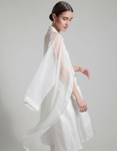 Limited Edition A unique combination of silk, delicacy and finesse. This dress adds a sensual touch to every occasion. 100% organza silk Carefully selected from high-quality surplus fabric in ItalyCrafted in Lithuania Hand washDo not bleachIron low if necessaryDo not tumble dryDry clean White Kimono Dress, Organic Labels, White Kimono, European Union, Kimono Dress, Lithuania, Ballet Skirt, Normcore, Limited Edition