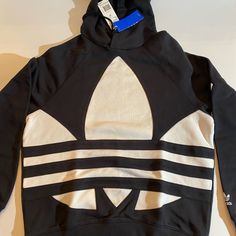 New With Tag Men’s Adidas Hoody Black. N Measurements For A Size S: Width 23”, Top To Bottom 25”, Arm Length 31” Adidas Black Hoodie For Streetwear, Adidas Black Hoodie With Ribbed Cuffs, Adidas Logo Hooded Hoodie, Adidas Black Hoodie With Drawstring Hood, Black Adidas Hoodie With Ribbed Cuffs, Adidas Black Sweatshirt With Drawstring Hood, Adidas Urban Cotton Sweatshirt, White Long Sleeve Adidas Sweatshirt, White Adidas Logo Cotton Sweatshirt