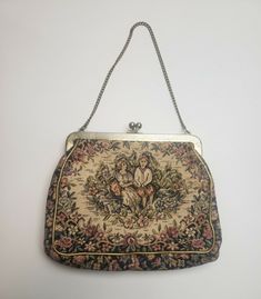 YOU ARE BUYING A  VINTAGE FLORAL SCENE JR MIAMI WOMENS PURSE THE ITEM IS USED. THERE IS SOME LIGHT WEAR ON THE ITEM. THE ITEM MEASURES APPROX. 7.25IN WIDE, 6IN HIGH & 1.75IN THICK. THE DROP LENGTH IS APPROX. 5.75IN LONG. PLEASE REVIEW PICTURES. ANY QUESTIONS PLEASE ASK. THANKS Materialistic Things, Antique Stuff, Handbag Ideas, Sew Bags, Plus Wedding Dresses, Vintage Designer Bags, 2024 Prom, Vintage Purses, Little Outfits