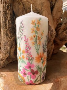 Add a splash of colour to your life! Unique designs for unique homes! 'Wildflower Garden' is an understated, classic print!  This candle is 15cm x 7cm. (matching Light Jars are available). Our candles are decorated using the heat transfer process. Each candle is unique.  No additional chemicals are added during the decoration process, ensuring they are safe to burn.  They burn beautifully giving a soft glow - and a lovely warm shine through the outer design.  Of course, our stunning candles can Decorated Candles, Candles Unique, Candle Crafts, Candle Crafts Diy, Outer Design, Candle Plate, Candle Craft, Wildflower Garden, Jar Lights