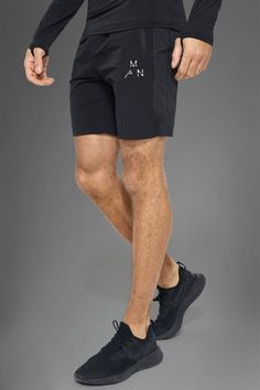 A gym essential you need gym shorts are an essential in your everyday wardrobe, especially in your fitness and casual wear. These shorts are not just about comfort and ease, they are designed for the active lifestyle, whether you're hitting the gym or going for a run with your mates. Our range includes a variety of styles, such as leggings shorts for optimal performance, lightweight running shorts for agility, and stylish, relaxed-fit shorts for everyday wear. The colour palette ranges from classic neutrals to bold shades making it easy to team up with your favourite gym tee and sneakers.Style: Plain ShortsDesign: PlainFabric: PerformanceFit: Regular Squat Proof Nylon Athletic Shorts For Training, Squat Proof Nylon Athletic Shorts For Workout, Athleisure Squat Proof Shorts For Running, Breathable Fabric Shorts For Training, Breathable Sportswear Activewear Shorts, Sportswear Athletic Shorts With Built-in Shorts For Running, Sporty Squat-proof Running Shorts, Breathable Short Activewear For Sportswear, Functional Sweat-resistant Activewear Shorts