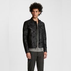 John Varvatos Foil Printed Slim Fit Trucker Jacket. Black Size Xs Brand New With Out Tags Attached Designed For A Slim Fit Spread Collar Full-Zip Front Placket Long Sleeves, Snap-Button Cuffs Allover Foil-Printed Design Two Front Hand Pockets; Two Flap Pockets With Snap-Button Closures At Chest Adjustable Hem With Strap-And-Snap-Button Closures Lined 63% Polyester/34% Cotton/3% Elastane; Lining: 100% Polyester Dry Clean Fitted Black Denim Jacket For Work, Tailored Black Leather Jacket For Winter, Designer Denim Jacket For Workwear In Fall, Designer Denim Jacket For Fall Workwear, Designer Fitted Outerwear With Flap Pockets, Fitted Streetwear Outerwear With Flap Pockets, Fitted Outerwear With Flap Pockets For Streetwear, Casual Fitted Biker Jacket With Flap Pockets, Luxury Black Outerwear With Flap Pockets