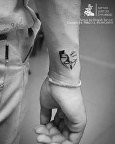 https://www.instagram.com/p/Cbu1CoGPTT4/?igshid=YmMyMTA2M2Y= V For Vendetta Tattoo Design, Small Dark Tattoos For Men, Hand Mask Tattoo, 1st Tattoo Ideas For Guys, Modern Tattoo Designs Unique, Best Tattoo Design For Men Unique, Anonymous Mask Tattoo